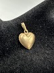8K Guld Hjerte VedhængVægt: 0,73g L.: 1,3cm Stemplet: 333 HS