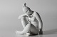 Bing & GrøndahlFigur af ung grønlandsk inuit kvinde model nr. 2281Fremstillet af hvidt ...
