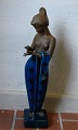 Royal 
Copenhagen 
Stoneware. 
21696 RC 
"Yasmin" Woman 
with a piece of 
clothes on the 
arm 52 cm, ...
