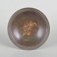 Just Andersen, Art Deco-fad i bronze.Rundt fad i bronze med bred, let profileret kant og ...
