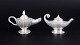 Just Andersen, et par olielamper i tin.Et par skulpturelt formede olielamper i tin med ...
