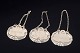 Three silver decanter labels.Three decorative silver decanter labels with chains and ...