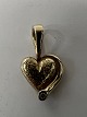 14 carat gold. Heart with inlaid diamond.Charms / Pendants.Height 1.8 cm.