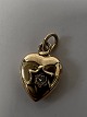 14 carat gold. Heart with inlaid diamond.Charms / Pendants.Height 1.1 cm.