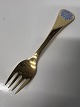 Års gaffel 1980 Georg Jensen, Cikorie.Forgyldt sterling sølv.Længde 14,8 cm.Flot og ...