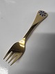 Årsgaffel 1986 Georg Jensen, Blå anemone.Forgyldt sterling sølv.Længde 14,8 cm.Flot ...
