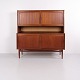 Dansk Model 53 skab i teak, fremstillet af Georg Petersens Møbelfabrik og dokumenteret i en ...