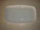 Bing & 
Grøndahl, 
Elegance, 
Bakke/Fad til 
sukker/fløde. 
Længde 27,5 cm. 
Bredde 15,5 cm. 
II. ...