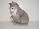Bing & Grøndahl 
Figur, Grå kat 
med hvid plet, 
der leger.
Af 
fabriksmærket 
ses det, at 
denne ...