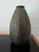 Metal vase med 
organisk 
relief.
Tin(?).
Stemplet: 
Antika 32 P.
Højde - 11 cm.