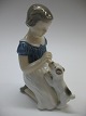 Bing og 
Grøndahl figur 
nr. 2316 pige 
med hund 
designet af 
Vita Thymann 
født 1925. 
Højde 13 cm. 
...