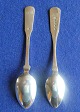 Musling silver cutlery, pair of tea spoons. 1 spoon in 3-tower silver from 1913, and 1 spoon in English "silver"??