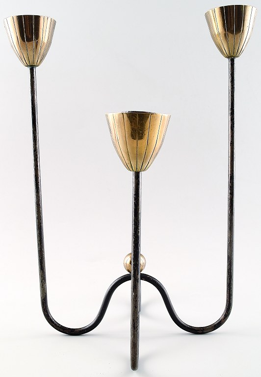 Gunnar Ander, Ystad Metall. Three-armed metal and brass candlestick.
