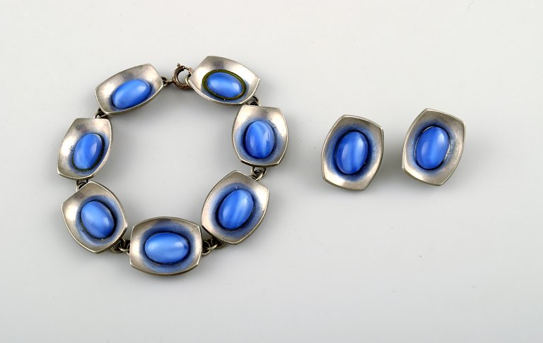 Jorgen Jensen, Vejle. Handmade jewelery set in pewter with blue stones. Danish 
design, mid 20 c. Bracelet and ear clips.