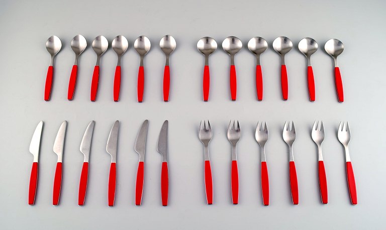 Complete service for 6 p., Henning Koppel. Strata cutlery in stainless steel and 
red plastic. Manufactured by Georg Jensen.