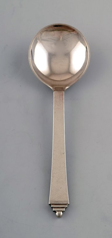 Eight Georg Jensen sterling silver pyramid bouillon spoons in sterling silver.