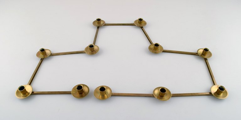 Swedish design table candlestick for 11 candles in brass, jointed.
1950/60 s.