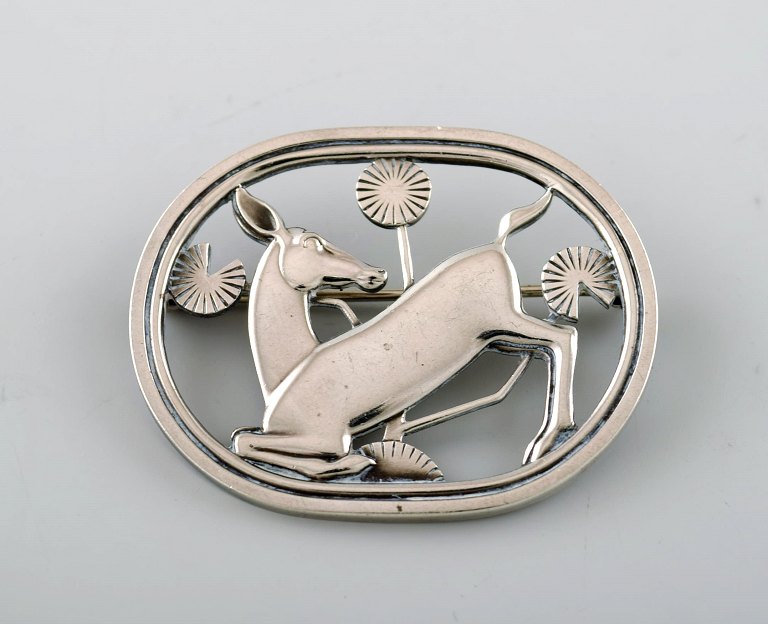 Sterling silver brooch by Georg Jensen. Design number 256. Deer motif.