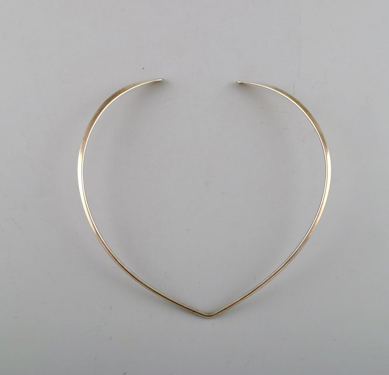 N.E. From sterling silver neck ring. Danish design 1970