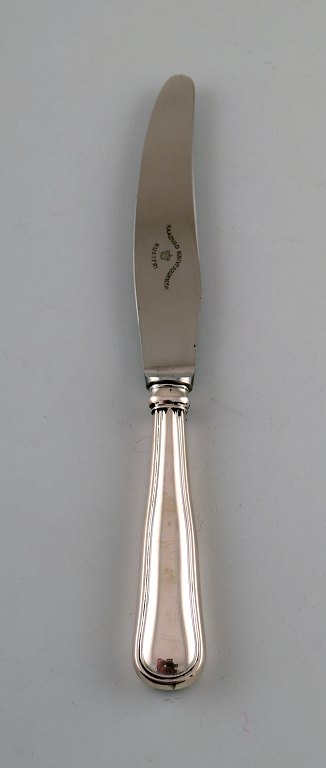 Cohr, dansk sølvsmed. Frokostkniv i tretårnet sølv. 1931.
