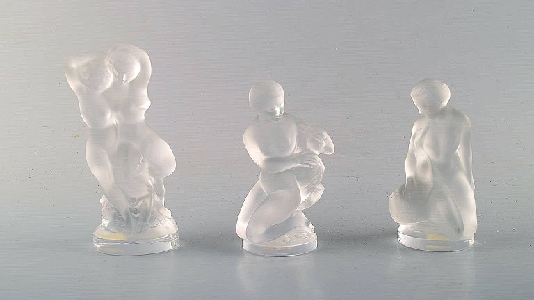 Lalique. Three female figures in clear art glass. 1960