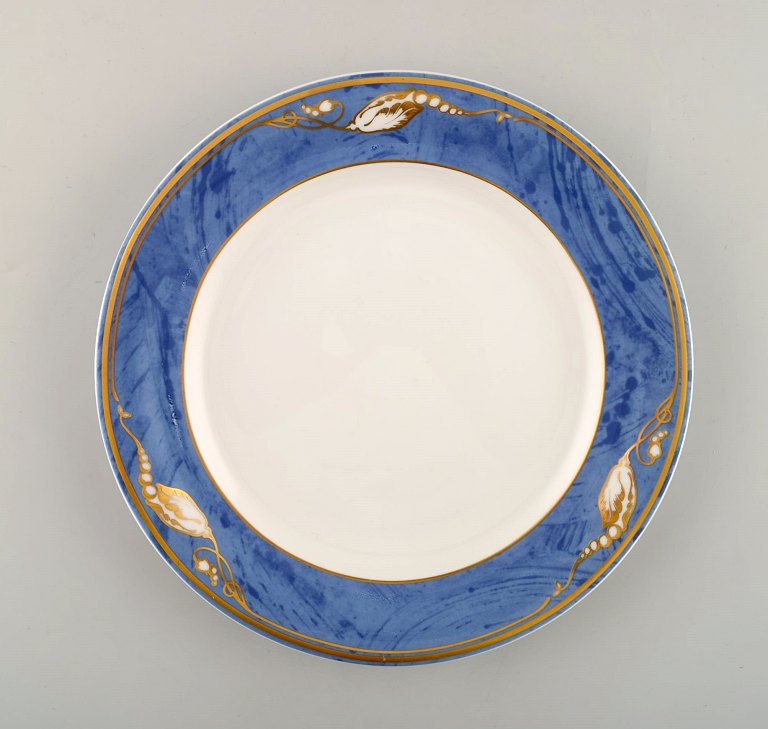 Royal Copenhagen. "Magnolia" lunch plate. 12 pieces in stock. Late 20th century.