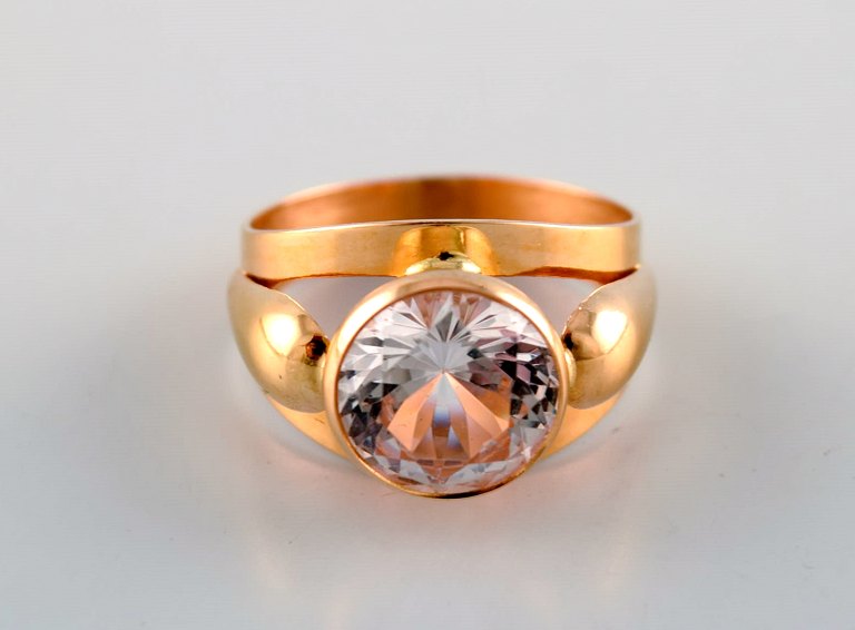 Swedish goldsmith. 18 carat gold ring with semi precious stones. 1970