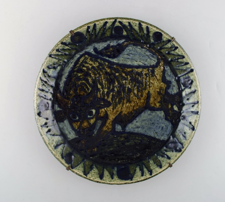 Lis Husberg Lundqvist for Rörstrand. Glazed ceramic dish with wall mount. Bull 
motif. 1940
