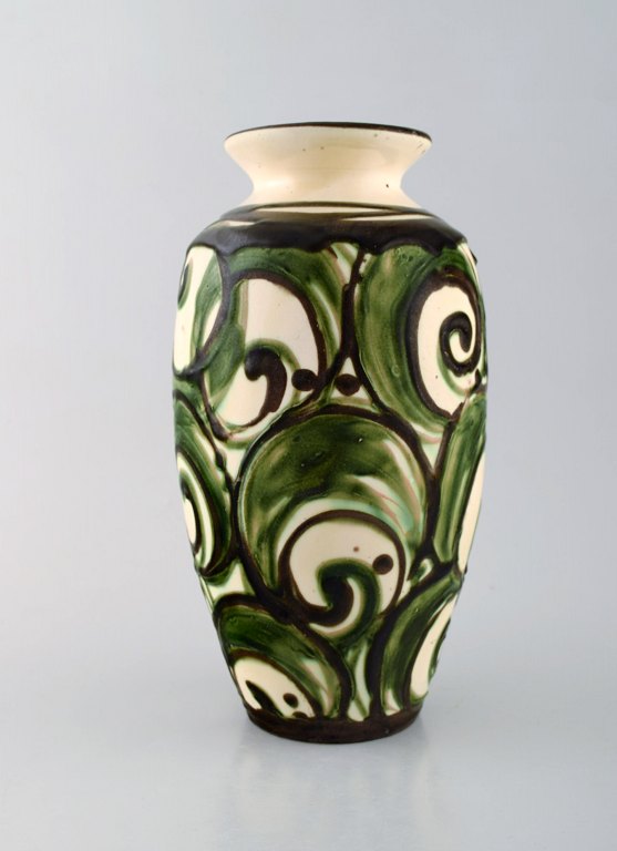 Kähler, HAK, glazed stoneware vase in modern design. 1930 / 40s. Beautiful glaze 
in green and black shades on light background.
