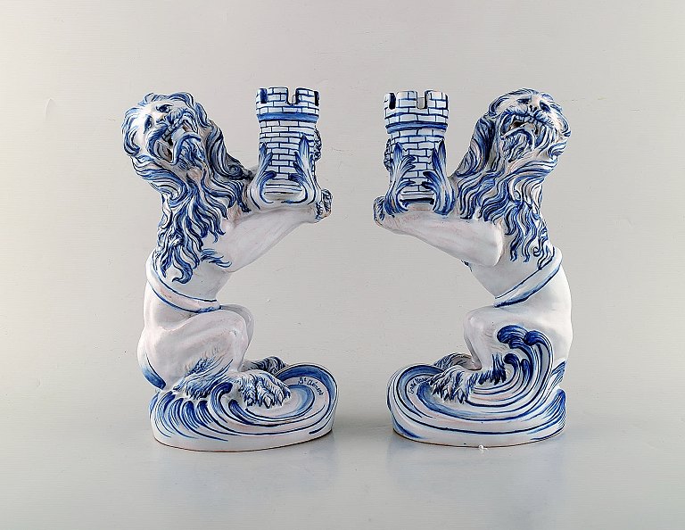 Emile Gallé for Nancy St. Clement. A pair of early and large candlesticks in 
faience shaped as lions. Ca. 1870.
