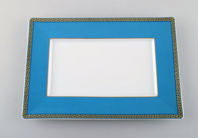 Gianni Versace for Rosenthal. "Arabesque" dish / tray in porcelain. Blue glaze 
and gold decoration. Late 20th century.
