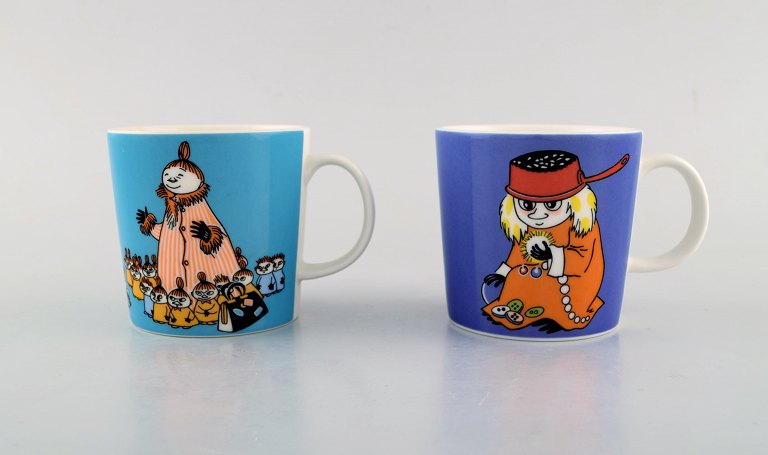 Arabia, Finland. Two cups in porcelain with motifs from "Moomin". Late 20th 
century.
