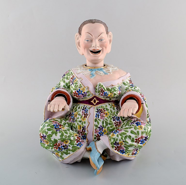 Large, rare and antique Meissen pogade in hand-painted porcelain with mobile 
head, tongue and hands. Museum quality, late 19th century. 
