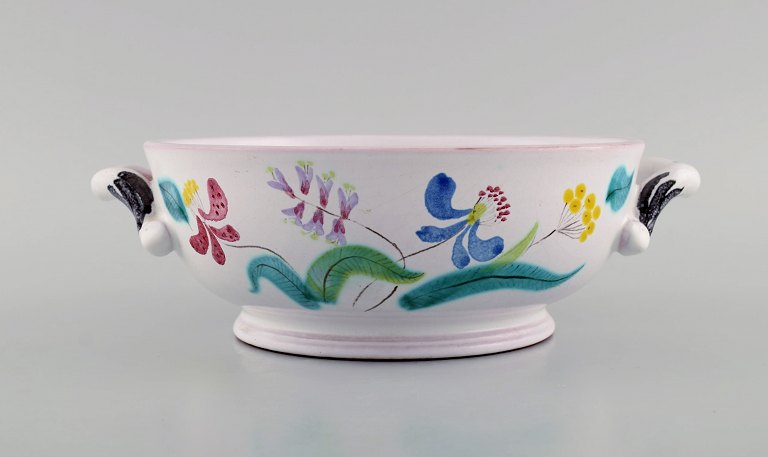Stig Lindberg for Gustavsberg Studio Hand. Bowl with handles in glazed faience 
with hand-painted flowers. 1940s.
