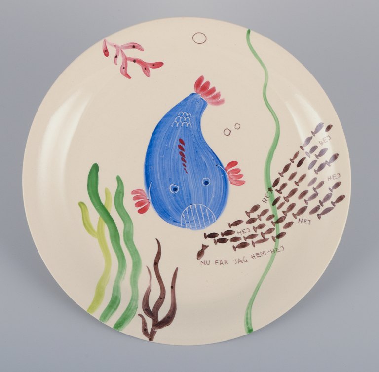 Stig Lindberg for Gustavsberg. "Löja" plate. Hand-painted with a fish motif. 
Satirical illustration with Swedish text.