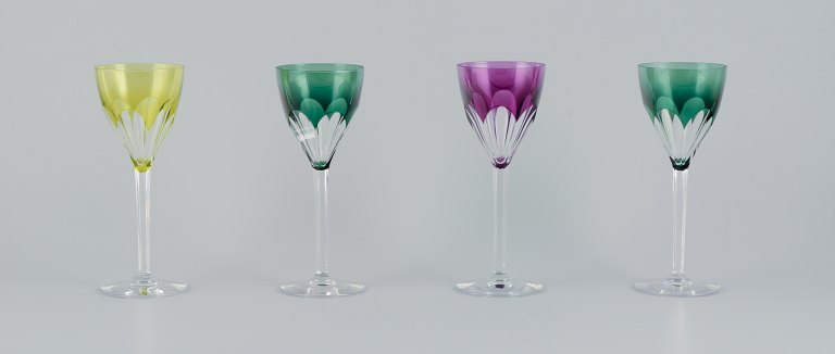 Val St. Lambert, Belgium. Four red wine glasses in faceted crystal.