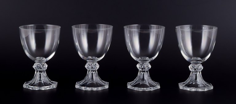 Val St. Lambert, Belgium. A set of six four wine glasses in clear mouth-blown 
crystal glass.