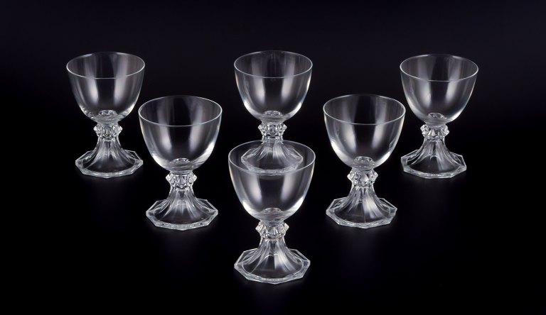 Val St. Lambert, Belgium. A set of six red wine glasses in clear mouth-blown 
crystal glass.