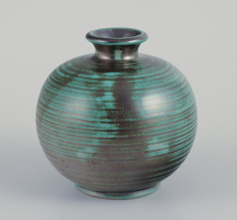 Upsala Ekeby, Sweden.Ceramic vase with glaze in green and black stripes.