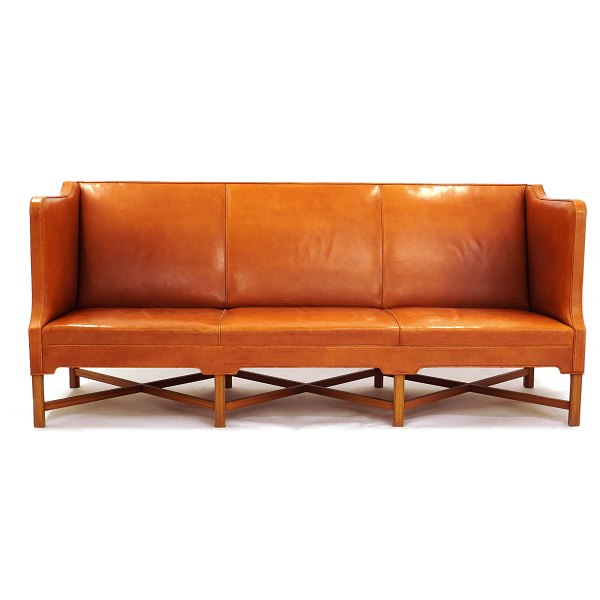 Kaare Klint three seater sofa with patinated natural leather. Very nice 
condition. L: 199cm. H: 82cm. D: 80cm