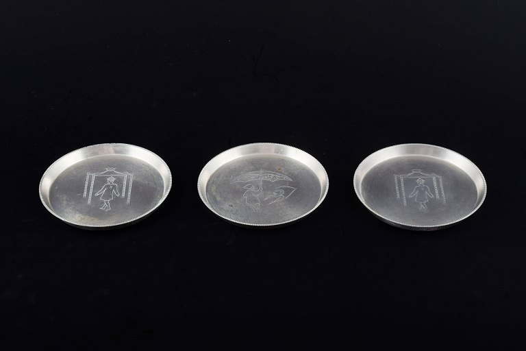 Just Andersen, three bottle coasters, model 2620.