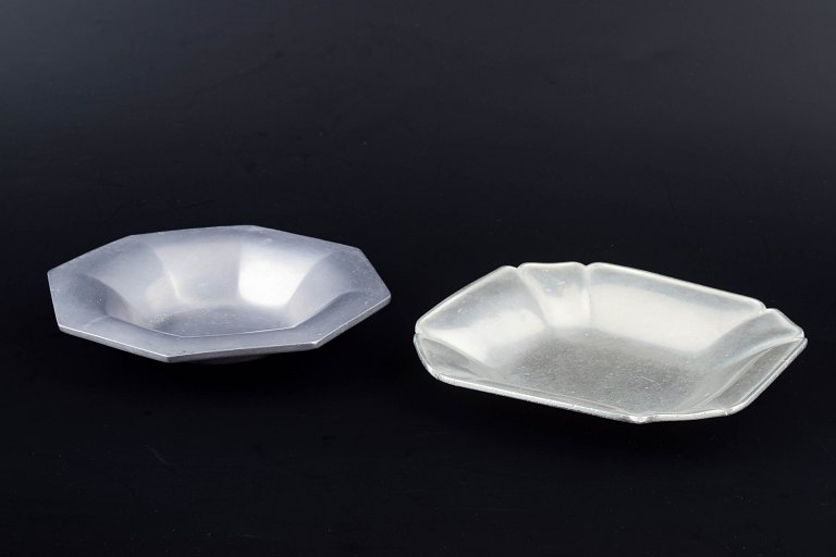 Just Andersen, Denmark.
Two pewter dishes, one octagonal and the other with rounded angular corners.