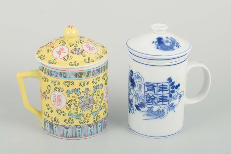 China
Two lidded tea cups with strainers, c. 1970s/80s.